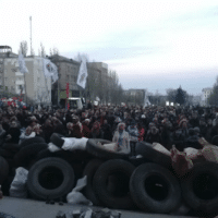 Anti-Maidan protesters gather in front of the occupied Donetsk Oblast regional administration building, April 2014